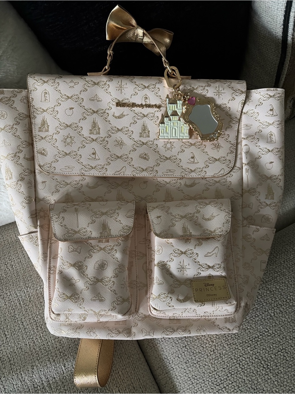 Limited Edition Cream and Gold Disney Princess Print Backpack with Bow Charm